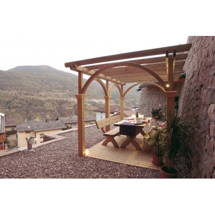 Wall supporting pergola